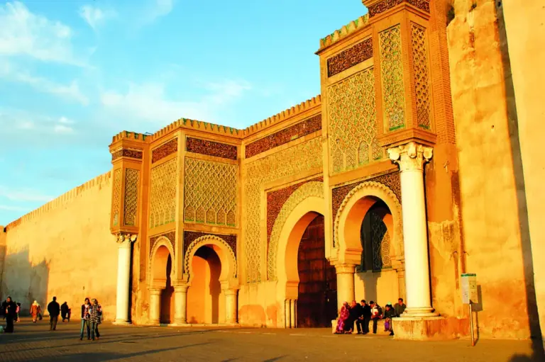 The Bab Mansour gate in Meknes lit by late afternoon sun