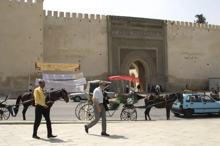 Horse carriages waiting on Place el Hedim square in Meknes