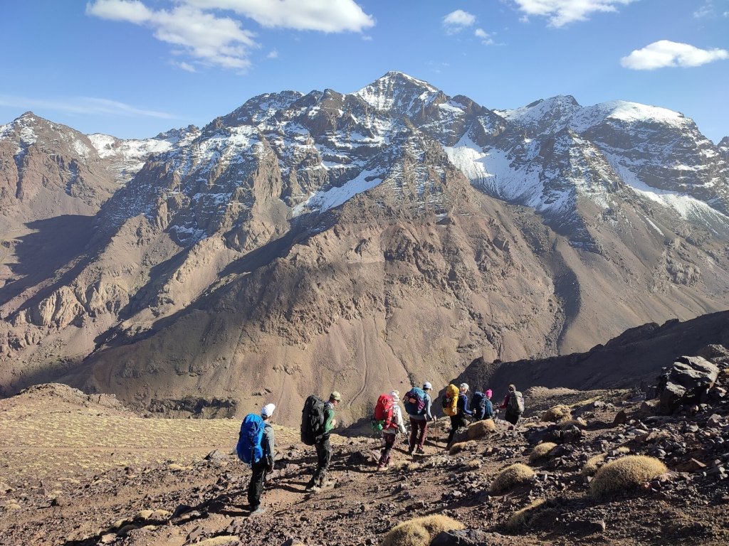 A group of hikers on the trail below Jebel Toubkal in the High Atlas Mountains